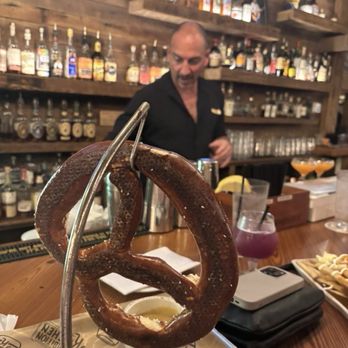 Prohibition Kitchen - Huge Pretzel and our server at the bar - he did a wonderful job getting us fed and getting us the best drinks - Bars Near Me - St. Augustine, Florida