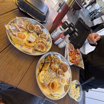 BVL Oyster Bar - Chargrilled with garlic Parmesan and bacon - Cocktail Bars Near Me - Brooksville, Florida