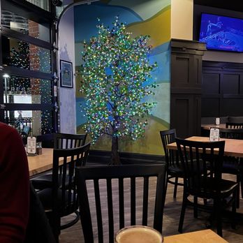 Upland Brewing - a christmas tree painted on the wall - Breweries Near Me - Carmel, Indiana Upland Brewing - a christmas tree painted on the wall - Breweries Near Me - Carmel, Indiana
