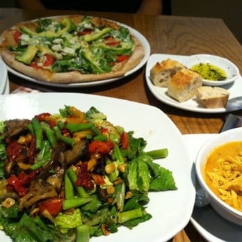 California Pizza Kitchen - Roasted Veggie Salad (while serving), a side of tortilla soup, bread and olive oil, and the California Club Pizza - Pizza Near Me - Troy, Michigan California Pizza Kitchen - Roasted Veggie Salad (while serving), a side of tortilla soup, bread and olive oil, and the California Club Pizza - Pizza Near Me - Troy, Michigan