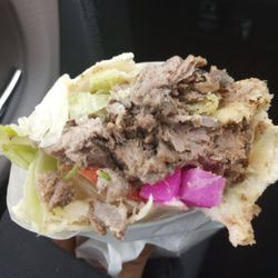 Shawarma Shish - Good amount of meat inside. Small beef shawarma. Lunch special $8.95, comes with a can of pop.