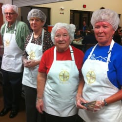 A New Leaf - Members of St Anthony on the Desert serving a meal at EVMC.