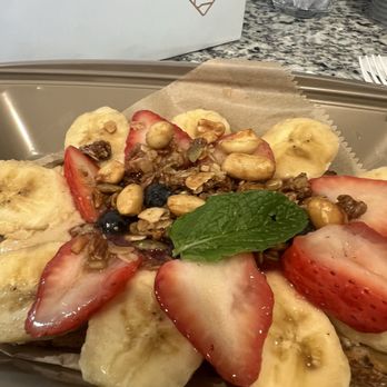 Toastique - PB Crunch Toast. Honey roasted peanut butter, bananas, berries, jam, granola peanuts, honey, mint on walnut raisin toast. - Juice Bars & Smoothies Near Me - Charlotte, North Carolina Toastique - PB Crunch Toast. Honey roasted peanut butter, bananas, berries, jam, granola peanuts, honey, mint on walnut raisin toast. - Juice Bars & Smoothies Near Me - Charlotte, North Carolina
