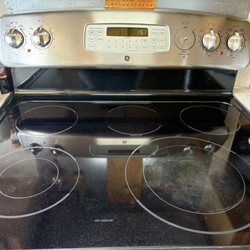 Taffy’s Sparkling Spaces - After pic of full glass stovetop