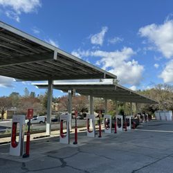 Pioneer Market & Pharmacy - Tesla charging stations in the parking lot