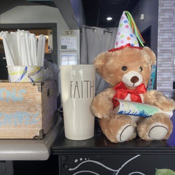 The Post  -  teddy bear wearing a party hat - Pizza Near Me - Fairfield, Connecticut