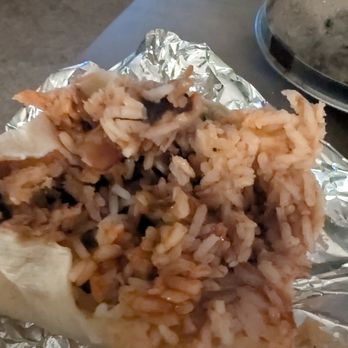 QDOBA Mexican Eats - A pile of rice in a burrito - Mexican Near Me - Fond Du Lac, Wisconsin