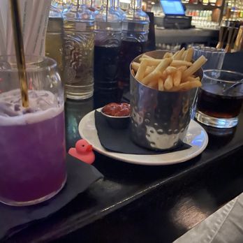 The Dickens - The Sweet Spot cocktail, fries, and a Montero cocktail - Cocktail Bars Near Me - New York, New York The Dickens - The Sweet Spot cocktail, fries, and a Montero cocktail - Cocktail Bars Near Me - New York, New York