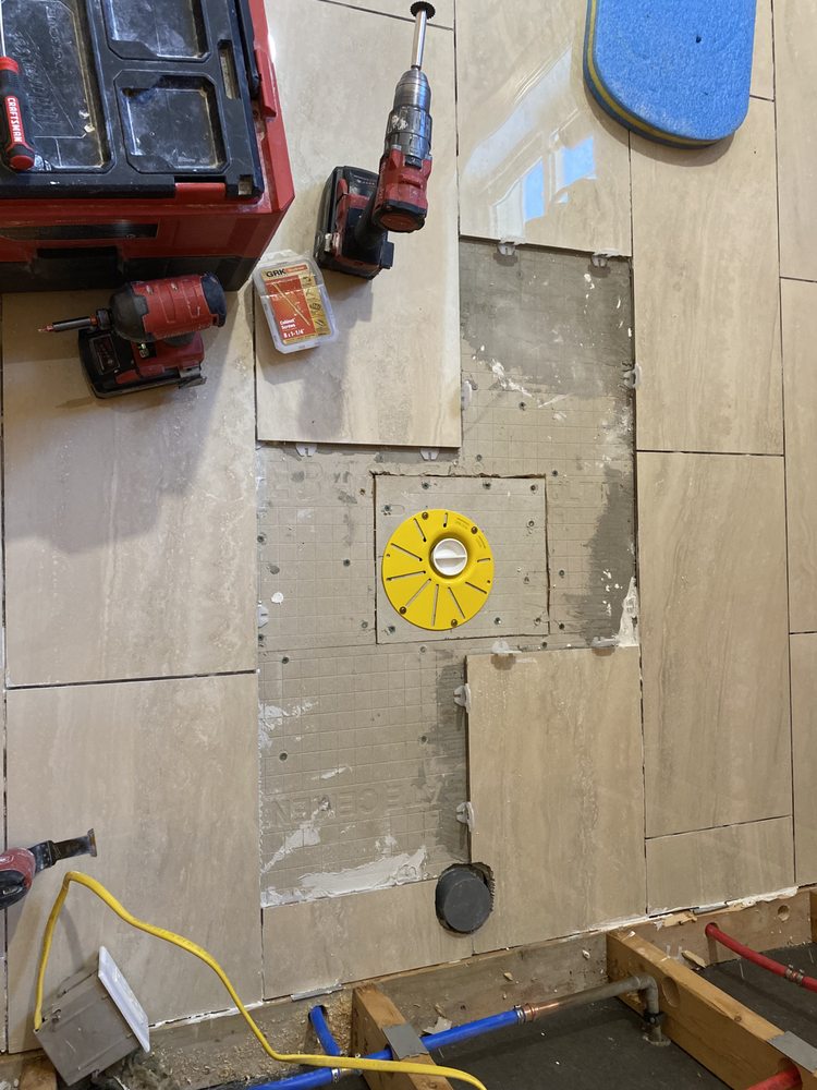 Slide of TK Construction and Plumbing