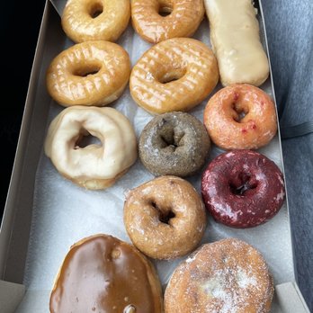 Carl's Donuts & Bakery - Glazed yeast, long john, strawberry, blueberry, red velvet, apple spice cake donuts. Caramel iced yeast, apple filled, & strawberry filled - Donuts Near Me - Avon, Indiana