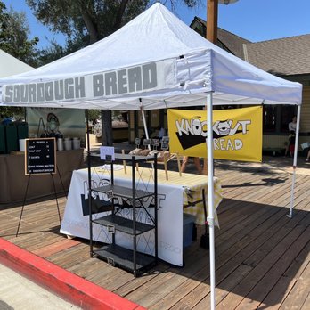 Poway Farmers Market - a white tent with a yellow sign - Farmers Market Near Me - Poway, California Poway Farmers Market - a white tent with a yellow sign - Farmers Market Near Me - Poway, California