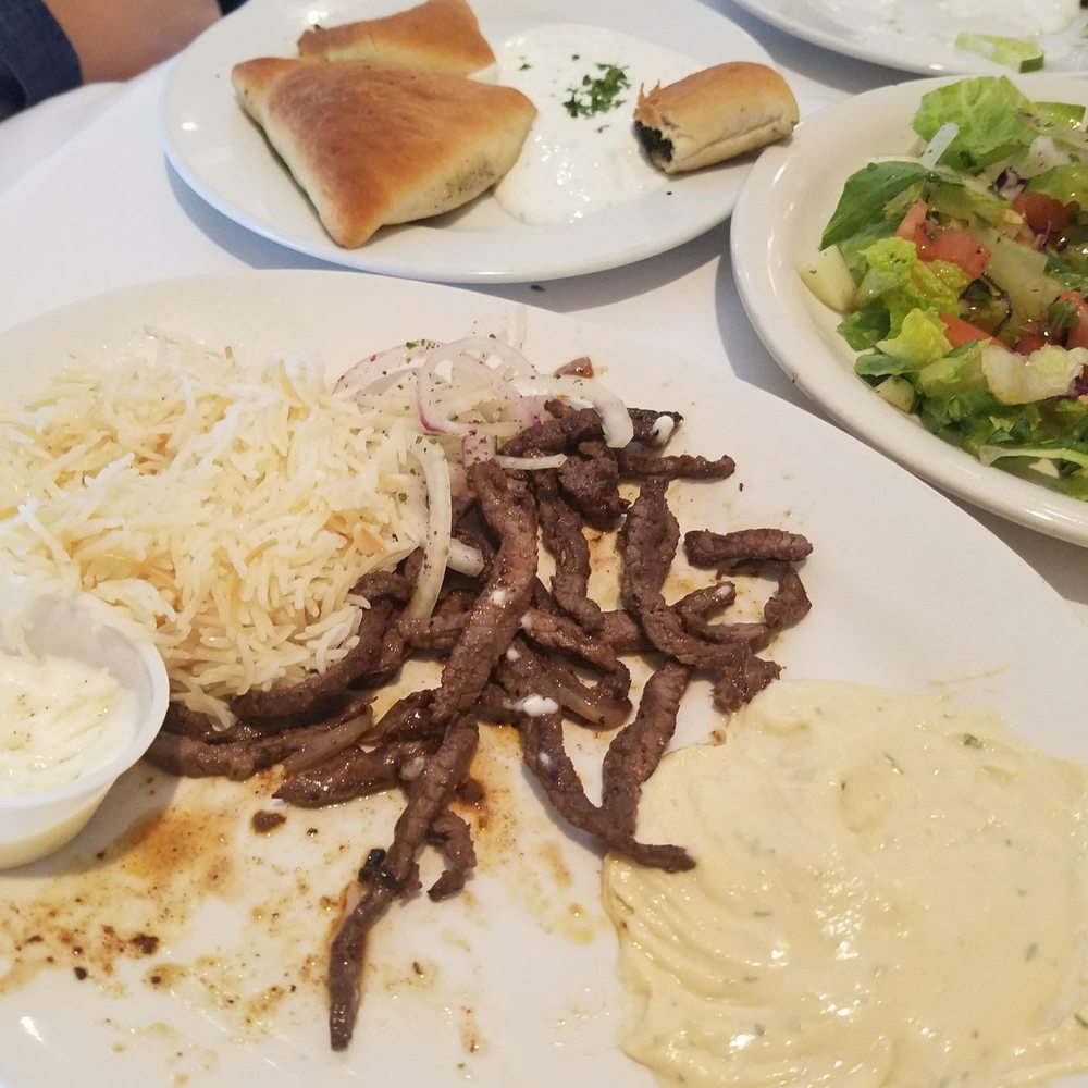 Cleopatra - I forgot name of dishes one is grilled lamb and the plate with the bread is a stuffed beef and spinich pies - Mediterranean Near Me - Harvey, Louisiana Cleopatra - I forgot name of dishes one is grilled lamb and the plate with the bread is a stuffed beef and spinich pies - Mediterranean Near Me - Harvey, Louisiana