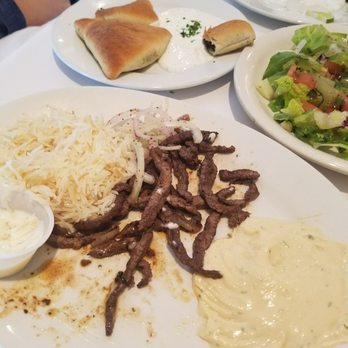 Cleopatra - I forgot name of dishes one is grilled lamb and the plate with the bread is a stuffed beef and spinich pies - Mediterranean Near Me - Harvey, Louisiana Cleopatra - I forgot name of dishes one is grilled lamb and the plate with the bread is a stuffed beef and spinich pies - Mediterranean Near Me - Harvey, Louisiana