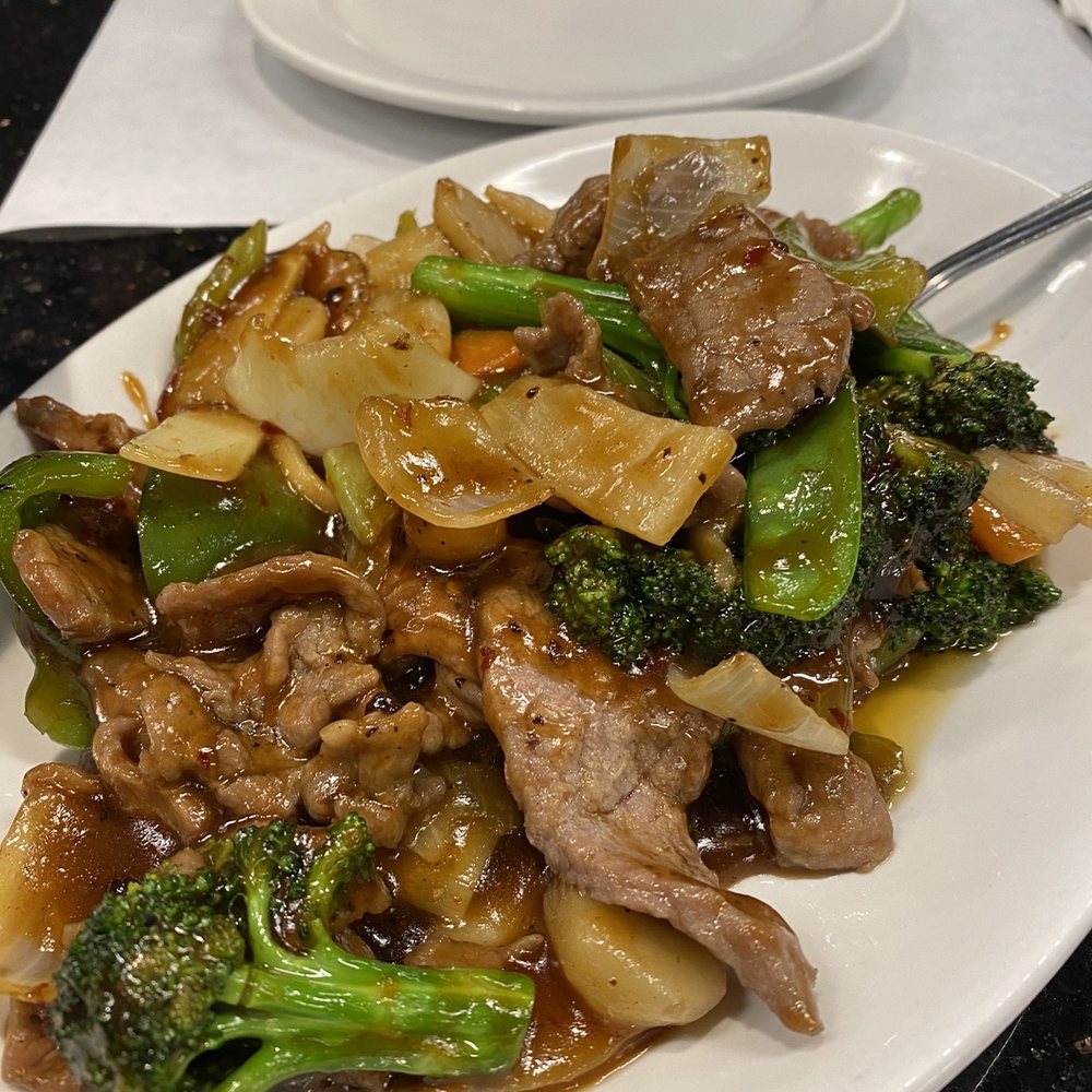 New Asia - a plate of stir fried beef and broccoli - Cantonese Near Me - Paducah, Kentucky New Asia - a plate of stir fried beef and broccoli - Cantonese Near Me - Paducah, Kentucky