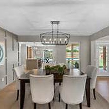 Open Concept Creations - a dining room with hardwood floors - General Contractors Near Me Open Concept Creations - a dining room with hardwood floors - General Contractors Near Me