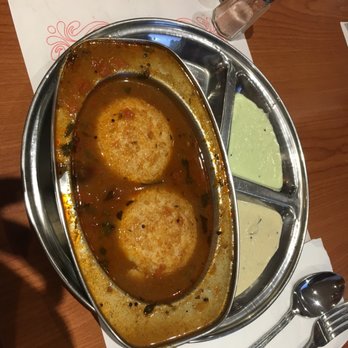 Dosa Pointe - a plate of food on a table - Indian Near Me - Montreal, Quebec Dosa Pointe - a plate of food on a table - Indian Near Me - Montreal, Quebec