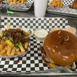 The Nashville spicy with pepper jack cheese, loaded fries, ranch dipping sauce, comeback dipping sauce.