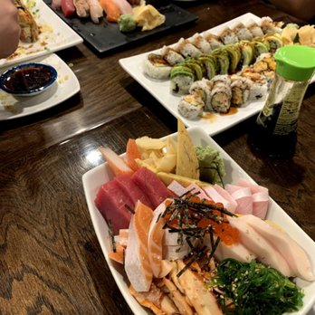 Sushi UNI - sashimi platter (top), an assortment of rolls (R), and chirashi bowl (bottom) - Sushi Bars Near Me - Lenexa, Kansas Sushi UNI - sashimi platter (top), an assortment of rolls (R), and chirashi bowl (bottom) - Sushi Bars Near Me - Lenexa, Kansas