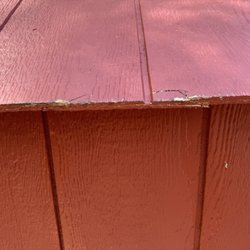 Another view of nesting box lid that is damaged.