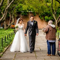 Denis Gostev Wedding Photography - Bride and groom meet older couple by Denis Gostev