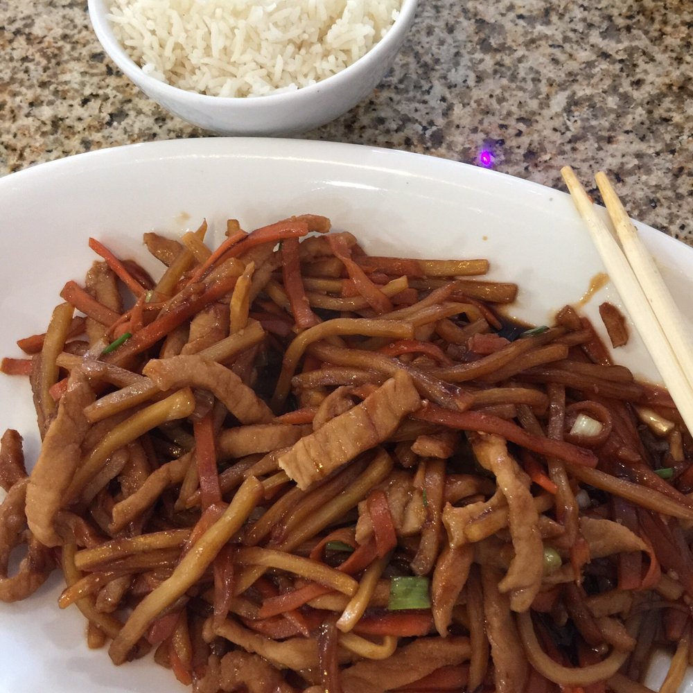 Saigon - a plate of stir fried noodles and chopsticks - Sandwiches Near Me - Lubbock, Texas Saigon - a plate of stir fried noodles and chopsticks - Sandwiches Near Me - Lubbock, Texas