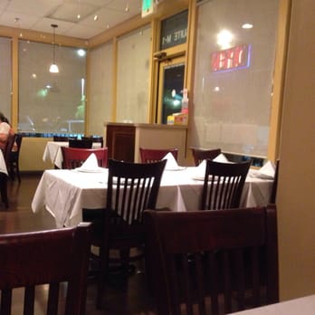 Blue Elephant - View of the entrance from a booth. - Thai Near Me - Bakersfield, California