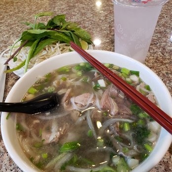 Pho Xe Lua - Number 9 with rare slices, brisket and tripe. Side of coconut juice. - Vietnamese Near Me - Sacramento, California