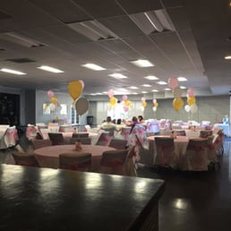 Table linen and balloon bouquets for a baptism. They did a great job!