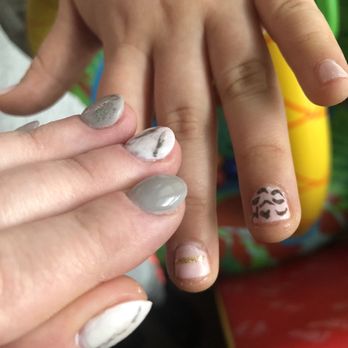 Universal Nails Auburn - Seriously I can't even look at these. The black marks are supposed to be animal print ‍ - Waxing Near Me - Auburn, Washington