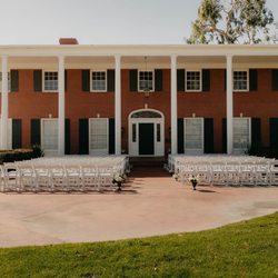Crestmore Manor - The staff at crestmore set up all of our chairs in front of the Manor and the tables in the carriage house.