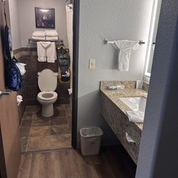 AmericInn by Wyndham Medora - Bathroom and vanity/sink area