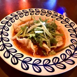 Steamed Dumplings In Chili Sauce.