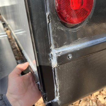 Camping World - Thornburg - The repaired loose back wall. Immediately loose again with poor sealant job. Stands out like a sore thumb. - RV Dealers Near Me - Thornburg, Virginia Camping World - Thornburg - The repaired loose back wall. Immediately loose again with poor sealant job. Stands out like a sore thumb. - RV Dealers Near Me - Thornburg, Virginia