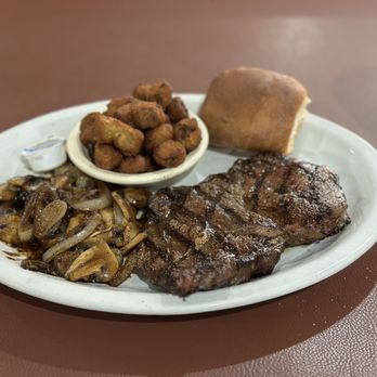Texas Steak & Grill - 14 oz ribeye steak with okra and mushrooms. - American Near Me - Terrell, Texas Texas Steak & Grill - 14 oz ribeye steak with okra and mushrooms. - American Near Me - Terrell, Texas