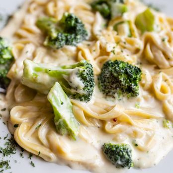 Pizza Empire - Denton - a plate of pasta and broccoli - Pizza Near Me - Denton, Maryland