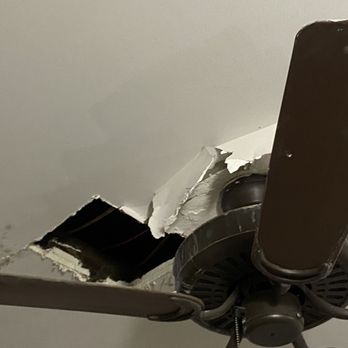 South Ridge - A leak led to bubbling paint, then this!  You'd have to walk on water through when it rained. It went unaddressed for almost a year! - Apartments Near Me - Greenville, South Carolina