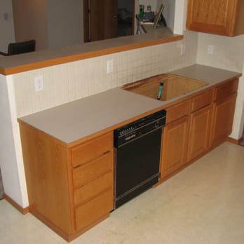 Victor's Granite & Marble - Kitchen sink and high counter that wraps around. - Building Supplies Near Me - Seattle, Washington Victor's Granite & Marble - Kitchen sink and high counter that wraps around. - Building Supplies Near Me - Seattle, Washington