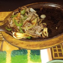 El Salto Authentic Mexican Restaurant - This is how much came out for my $17 Fajitas I pushed ut over to the side Its Maybe a 3rd of what you would expect