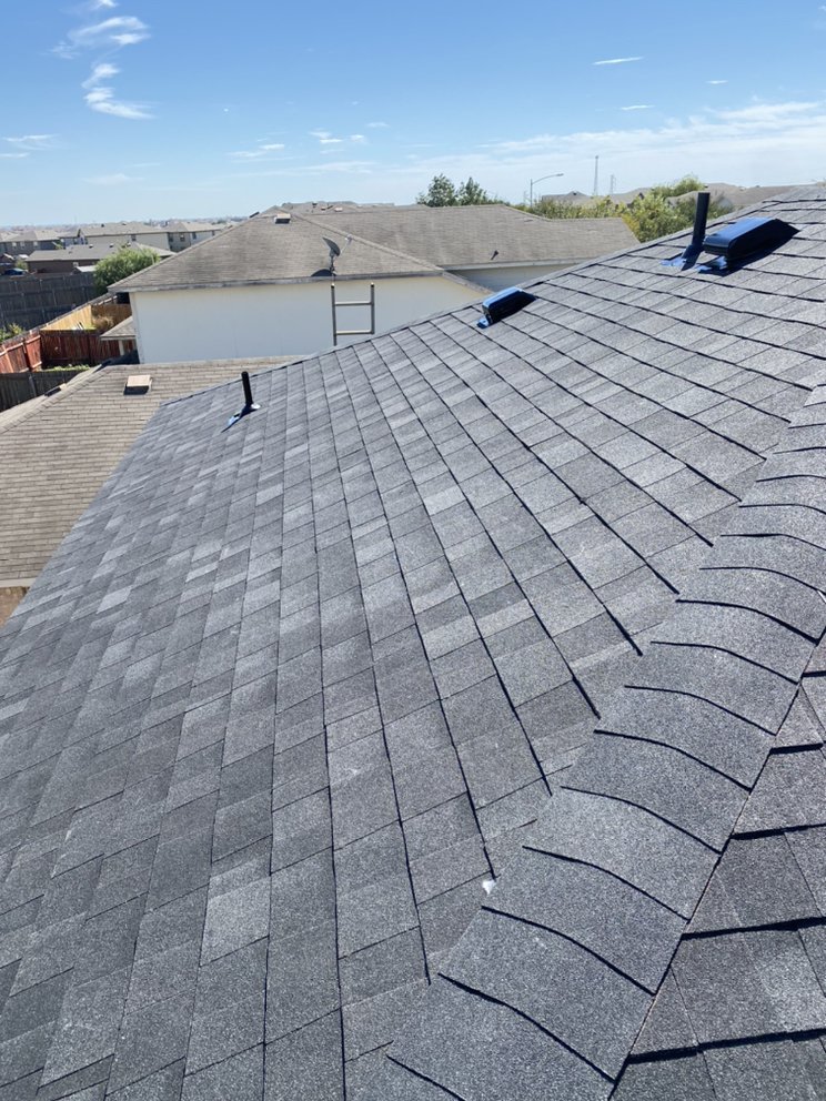 Slide of Regio's Roofing