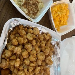 Popcorn shrimp with Mac n cheese and rice and gravy. Popcorn shrimp with Mac n cheese and rice and gravy.