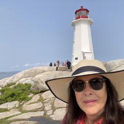 La Promenade Travel - Peggy's Point Lighthouse, is one of Nova Scotia's most well-known lighthouses and may be the most photographed in Canada.