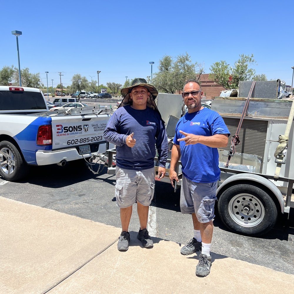 3 Sons Heating & Cooling - Jason and George pictured in front of our old unit. Great work, gentlemen! EVCT is grateful for you. - Heating & Air Conditioning/HVAC Near Me - Mesa, Arizona
