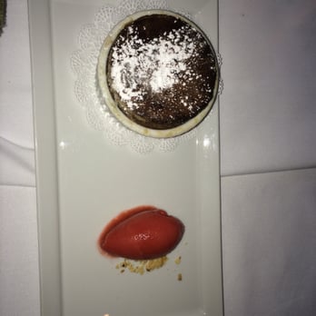 Fleurie Restaurant - Chocolate cake with molten ctr, berry sorbet - French Near Me - Charlottesville, Virginia