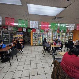 This is a view from the front counter to the back of the restaurant. This is a view from the front counter to the back of the restaurant.
