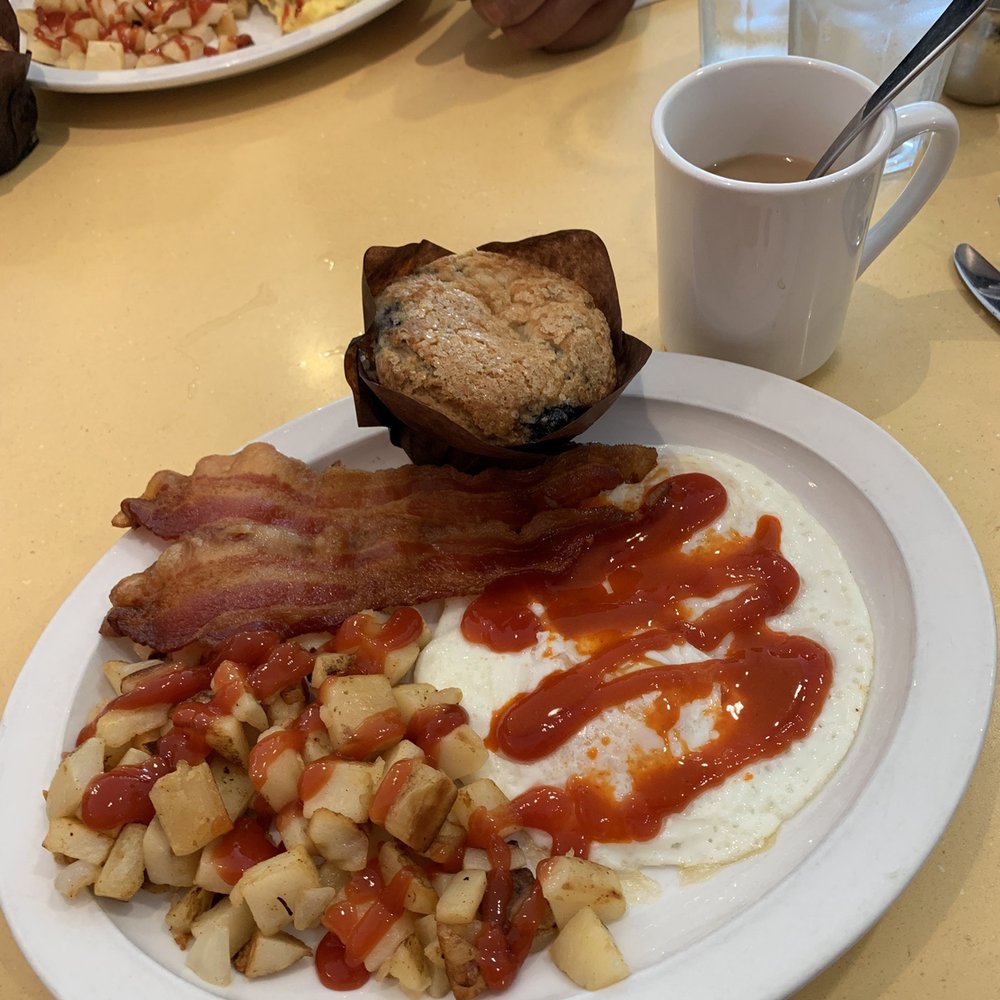 Wild Eggs - 2 eggs over-easy, skillet potatoes, 2 slices of bacon & a blueberry muffin. - Breakfast & Brunch Near Me - Carmel, Indiana Wild Eggs - 2 eggs over-easy, skillet potatoes, 2 slices of bacon & a blueberry muffin. - Breakfast & Brunch Near Me - Carmel, Indiana
