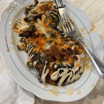 Cafe Landwer - The bread I didn't eat because it's clearly burnt. - Mediterranean Near Me - Boston, Massachusetts Cafe Landwer - The bread I didn't eat because it's clearly burnt. - Mediterranean Near Me - Boston, Massachusetts