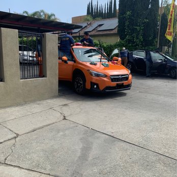 JN car wash - My wife's car being waxed on the roof which they claimed they had been done before I told them it wasn't. - Auto Detailing Near Me - Eagle rock, California JN car wash - My wife's car being waxed on the roof which they claimed they had been done before I told them it wasn't. - Auto Detailing Near Me - Eagle rock, California