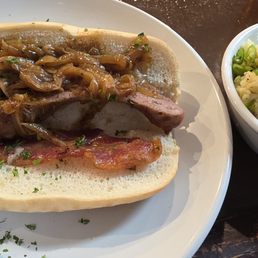 Beer brat sandwich and German potato salad Beer brat sandwich and German potato salad
