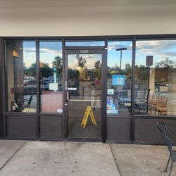 Tamale Kitchen - The lady walking away at 7:48 pm