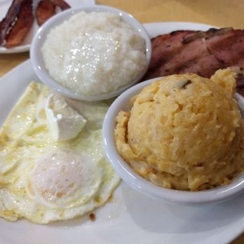 Butterfields Southern Cafe - I forget what they called this but I call it fabulous. Smoked pork chop, hash brown casserole, grits, and eggs. - American Near Me - Royal Palm Beach, Florida Butterfields Southern Cafe - I forget what they called this but I call it fabulous. Smoked pork chop, hash brown casserole, grits, and eggs. - American Near Me - Royal Palm Beach, Florida
